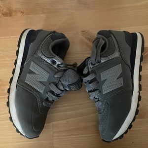 NWOT size 11 kids. Brand new never used gray new balance 574